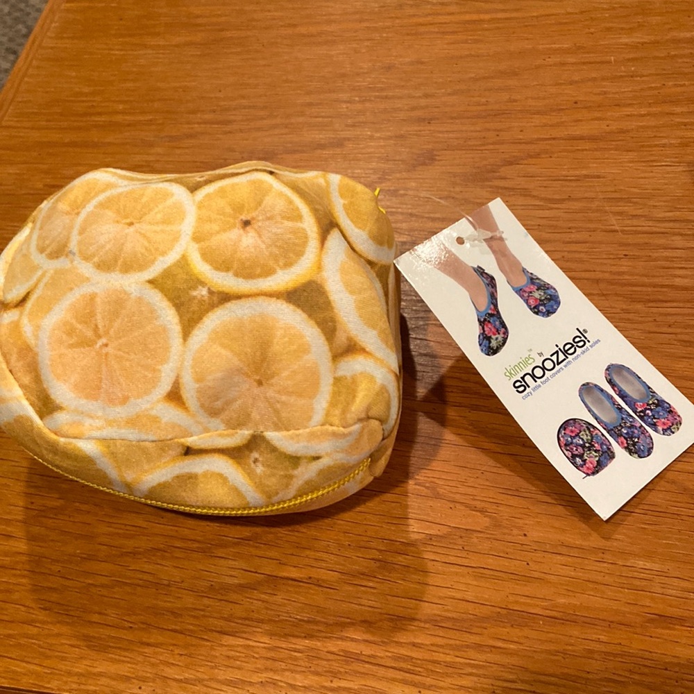 Snoozies , cozy slippers with non slip soles